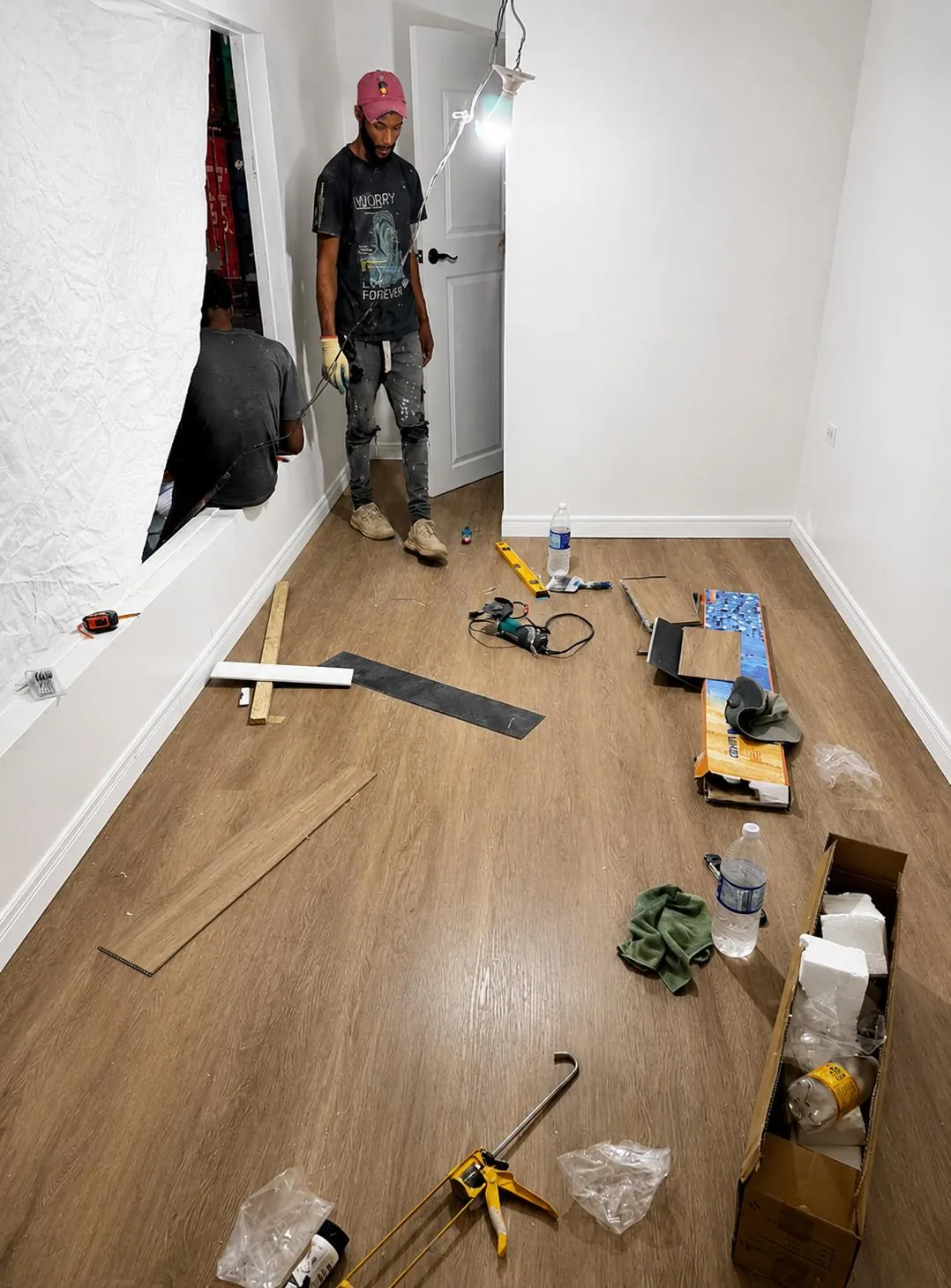 Container construction in progress with wood flooring